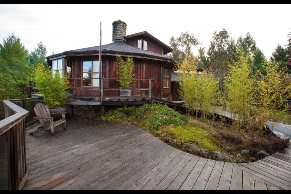 The Saltspring home is surrounded by wooden boardwalks.