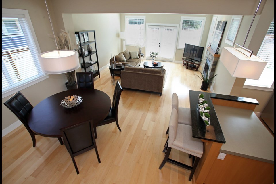 The living room, dining area and kitchen are all open to each other, making for family togetherness.