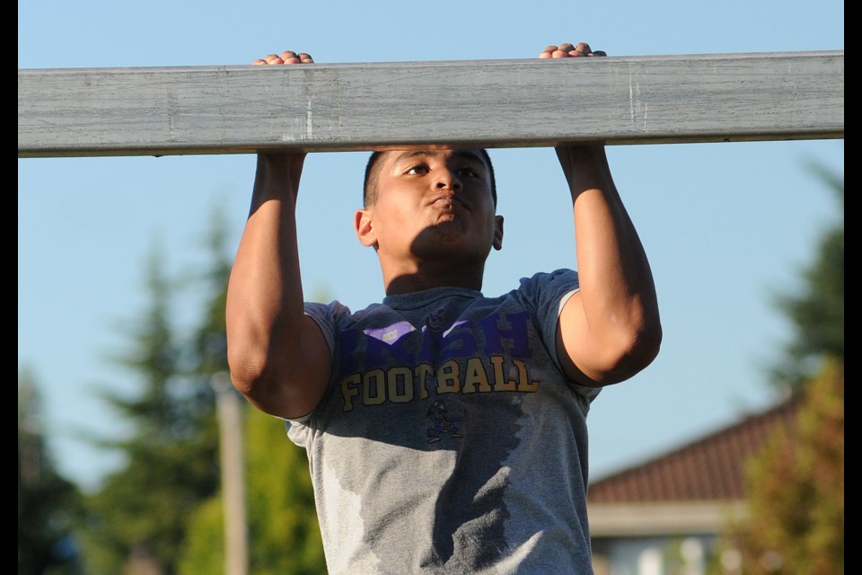 Bailey Saguin, 16, survived cancer and now plays football for Vancouver College.