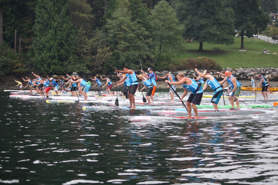 Participants in the Board the Fjord standup paddleboard race rip off of the starting line to begin their trek up and down Indian Arm Sunday, Sept. 15. Photo supplied