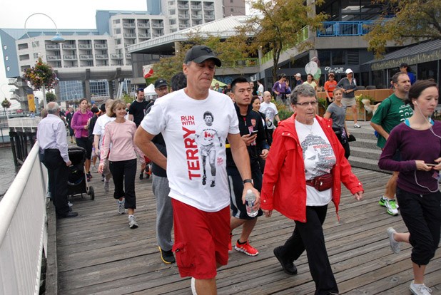 Participants in the 2013 Terry Fox Run in New Westminster take to the esplanade during last year's run on the riverfront.