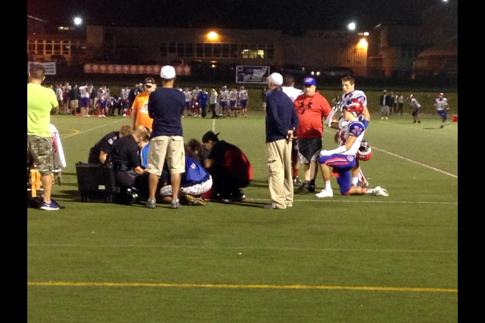 Delayed: Late in the third quarter one of the Coquitlam players broke his ankle. The game was delayed for abut 30 minutes as medical staff waited for an ambulance to transport the boy to hospital.