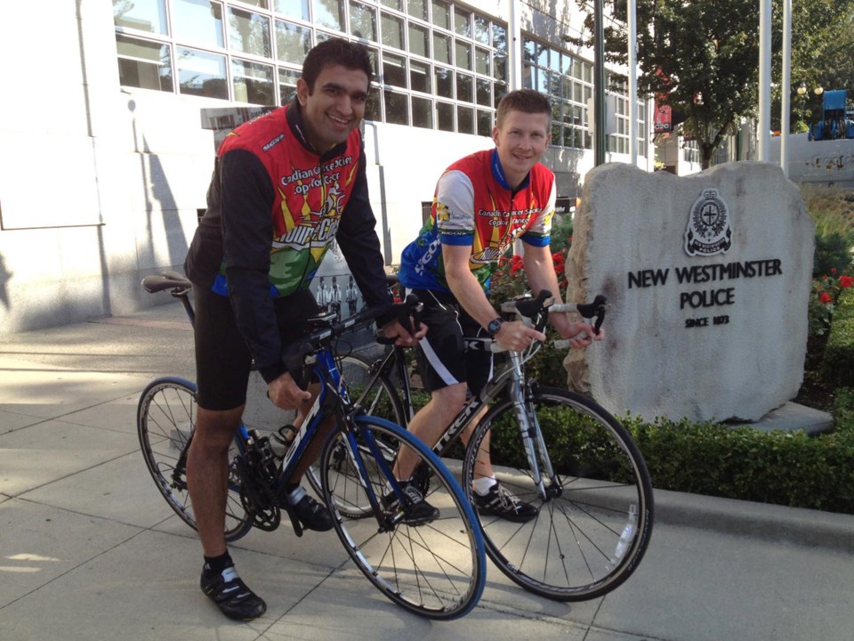 Constables Jaspaul Chung and Dave Lemire