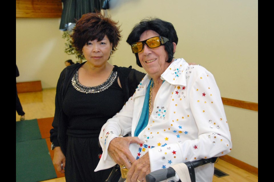 Chuck Johnston and Priscilla Sit at the auditions for Seniors Have Talent. Johnston did a musical number in full Elvis regalia.