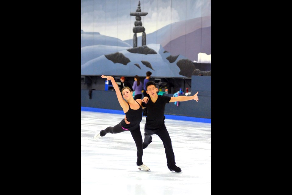 Going for gold: Burnaby-native Timothy Lum, right, and ice dancing partner Brianna Delmaestro, left, practise their routine for the junior Grand Prix in Poland. The pair placed fifth in the Baltic Cup - their first international competition as partners.