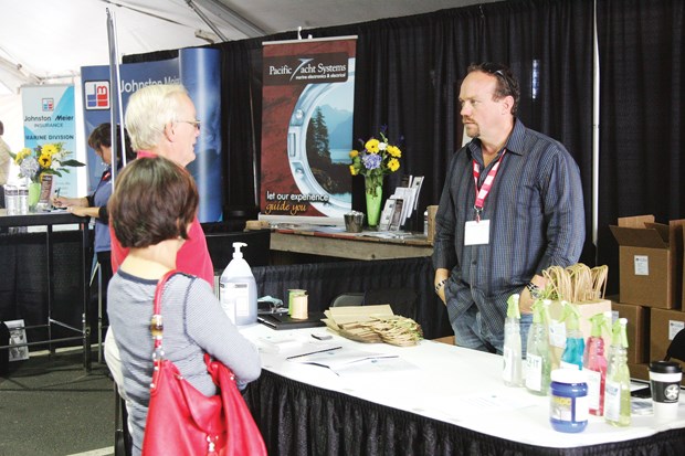The Mosquito Creek Marina boat show featured kiosks on land and boats in the water.