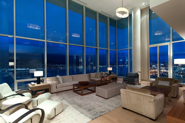 Two North Shore Brothers are celebrating after negotiating the largest residential real estate sale in Canadian history, involving the penthouse and three sub-penthouses of the Fairmont Pacific Rim in Coal Harbour.