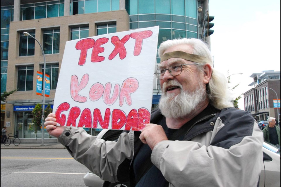 Senior power: Don Johnson took part in a seniors’ rally at Sixth and Sixth on National Seniors Day, Oct. 1. The sixth annual rally was organized by the Seniors Services Society.