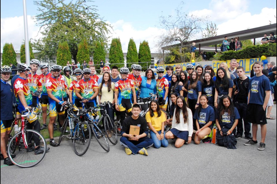 For the cause: Cops for Cancer's Tour de Coast kicked off in Burnaby with the first stop at Alpha Secondary School. Students at Alpha raised $1,500 for the pediatric fundraiser. Riders from various Lower Mainland police departments took part in the nine-day Tour de Coast, which started Sept. 18.