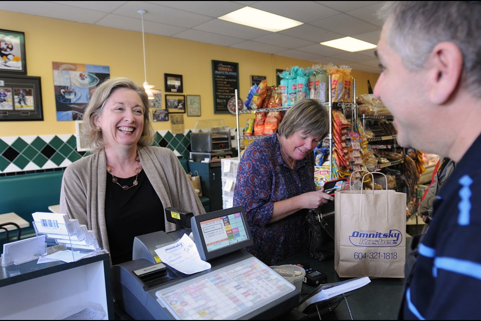 Leona Pinsky was one of Eppy Rappaport’s first customers when he opened Omnitsky Kosher on Cambie Street almost two decades ago. Behind the counter is kosher supervisor Eli Cohen.