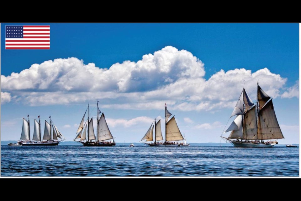 The schooner Mary Day, right, sails in a schooner race with other members of Maine's windjammer fleet off Rockland, Maine. The 90-foot Mary Day, which is celebrating its 50th season, is the first schooner in the Maine windjammer fleet to be built specifically to accommodate passengers. Its sleeping cabins are heated and have nine feet of headroom.