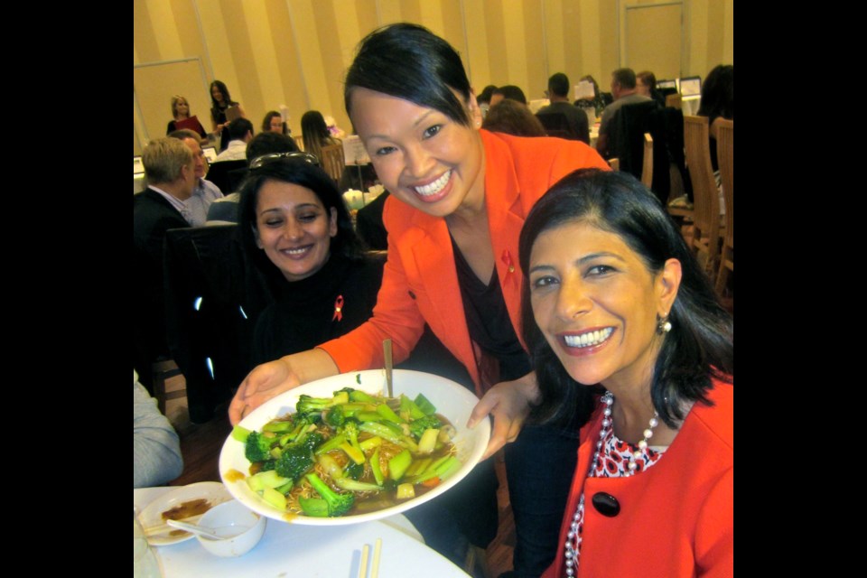 Courier publisher Dee Dhaliwal (right) enjoyed the fine service provided by CTV’s Ann Luu. The annual dim sum soiree benefitted AIDS Vancouver’s Asian Outreach project.