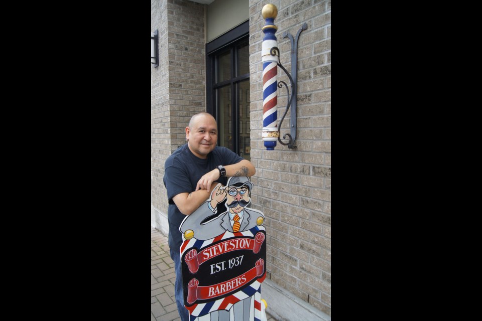 Graeme Wood/Special to the News Ray Tsuji has cut hair at Steveston Barbers for eight years and is a long-time Stevestonite.