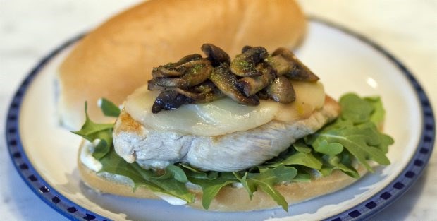 Chicken breast burgers feature Italian-style chicken in a bun with provolone and pesto-flavoured mushrooms.