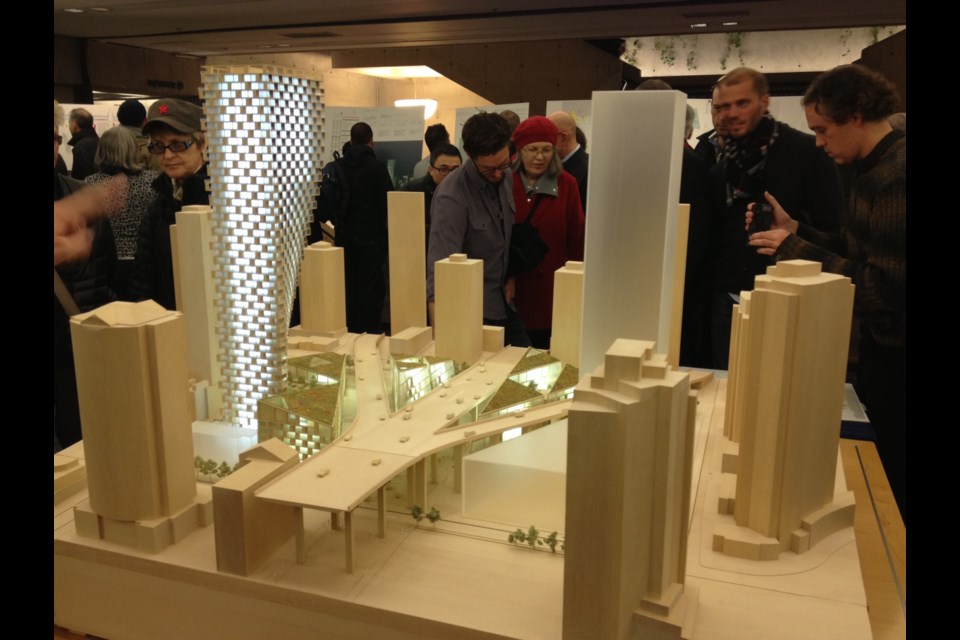 This model of the Westbank development project at the north end of Granville Street Bridge was revealed at an open house last February. It was the second of two open houses and attracted 403 visitors and a total of 51 comment sheets — 71 per cent in support, 14 per cent opposed. Photo by Naoibh O'Connor