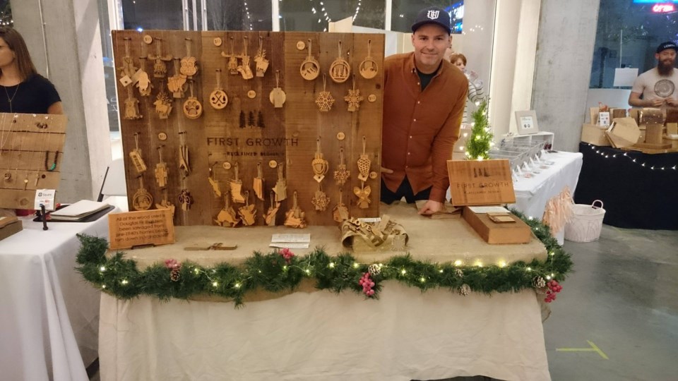 Garet Robinson with his display of Christmas ornaments