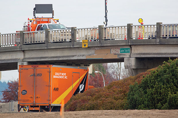 truck drives off overpass truck drives off overpass