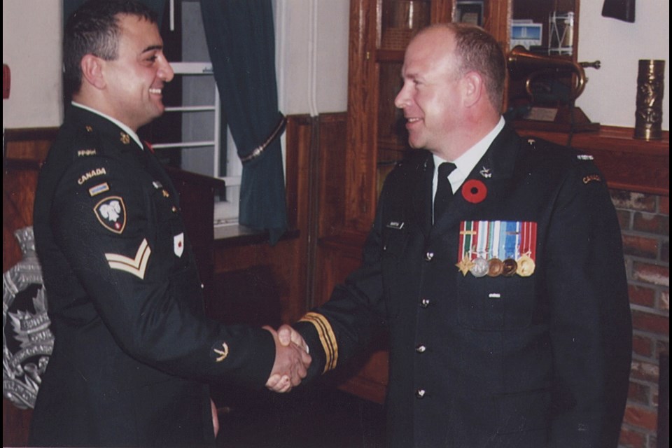Mike Pehlivanian (left) at a ceremony related to his military service. He joined the military in 2005 "to fight for Canada and the human race in Afghanistan." Photo courtesy Pehlivanian family.