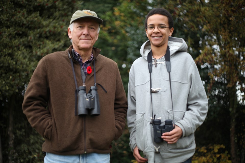 From left, Burnaby birders George Clulow and Khalid Boudreau, a Grade 9 student at Moscrop Secondary. Khalid discovered a new breeding ground for the American white pelican, while on vacation in the Interior.