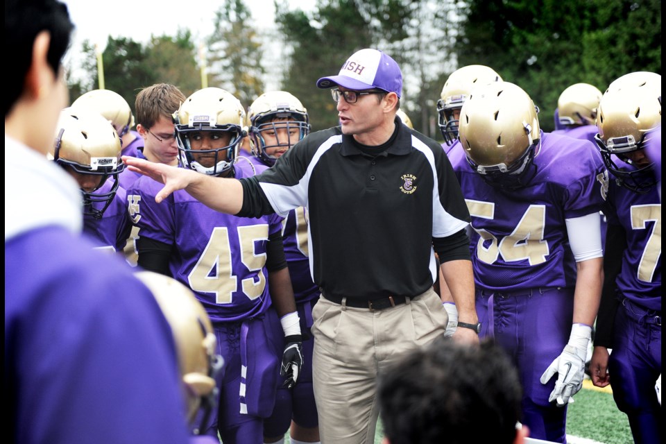 Doug Pauls holds the attention of the Vancouver College varsity football team in a playoff game at home against Mt. Boucherie Nov. 9.