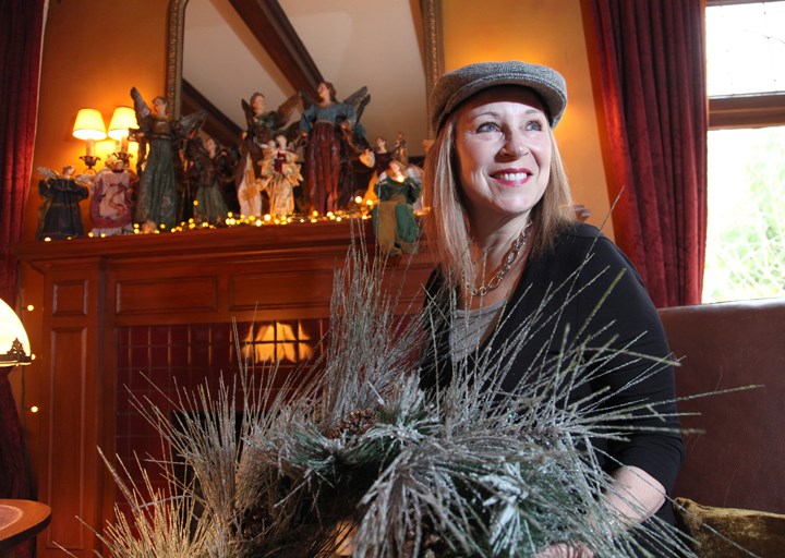 Happy holidays: Gail Ancill opened her home, the 1905 J.J. Johnson House, for last year's Homes for the Holidays tour. Six new homes will be adorned with Christmas decor - inside and out - for this year's tour.