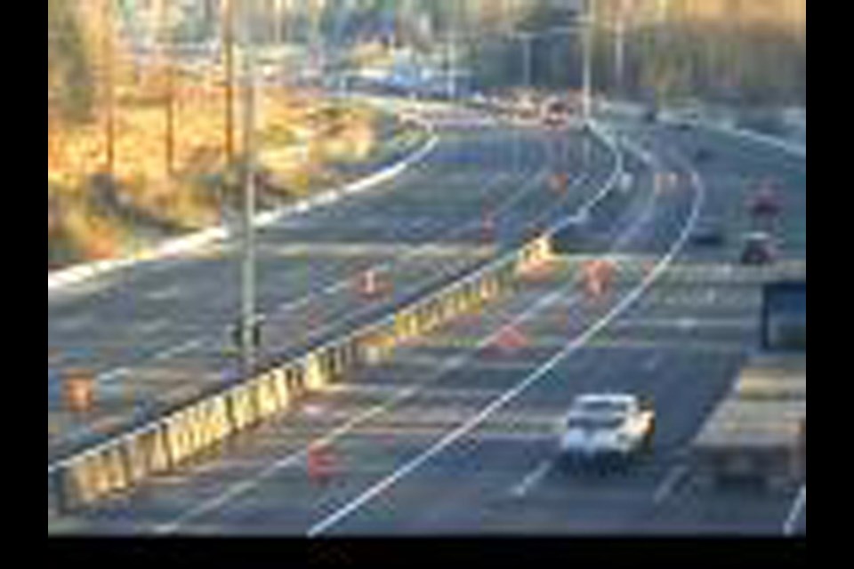 Closed: Highway 1, seen here facing east near the Gaglardi overpass. The westbound lane remains closed between Gaglardi and Kensignton as crews clear a tractor-trailer that caused a five-car accident Thursday morning.