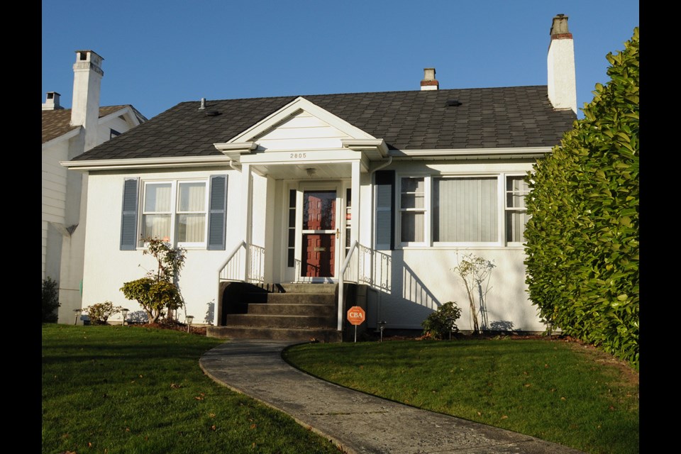 This 1942 Arbutus Ridge home has six bedrooms and two bathrooms. Photo Dan Toulgoet