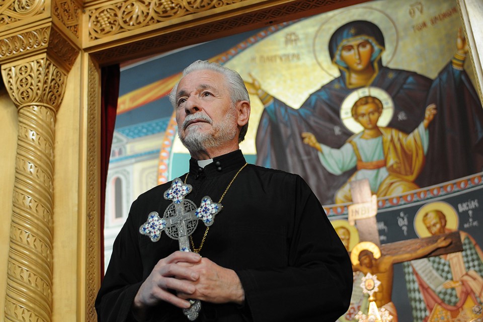 Rev. Demetrios S. Partsafas, who presides over the beautiful St. George Greek Orthodox Cathedral. Photo Dan Toulgoet