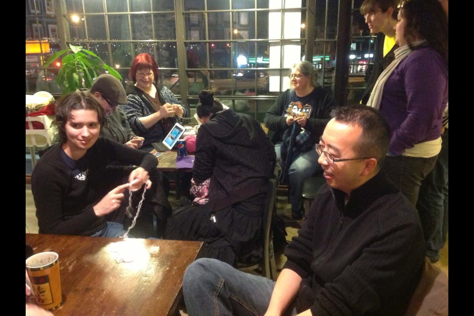 Sunday dinner: Andrea Westaway, one of Nerd HQ's organizers (far right), looks on as members of the Meetup group gather at La Fontana Caffe for the weekly Dinner and Death event.