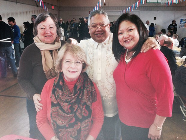 A Filipino breakfast fundraiser held last Sunday at the Sacred Heart Parish in Ladner raised over $12,000 for the victims of Typhoon Haiyan, which killed thousands in the Philippines earlier this month. Organizers thanked the local community, guests from other areas of the Lower Mainland, Delta South MLA Vicki Huntington, Philippine Consul General Neal Ferrer, the Rotary Club of Ladner and the Sacred Heart Knights of Columbus for their support. Pictured above are Linda Ottho (left) from the Rotary Club of Ladner, Alfredo and Racquel Goco and Huntington (sitting). Proceeds from the local event will go towards Gawad Kalinga, an organization working on relief efforts in the Philippines.