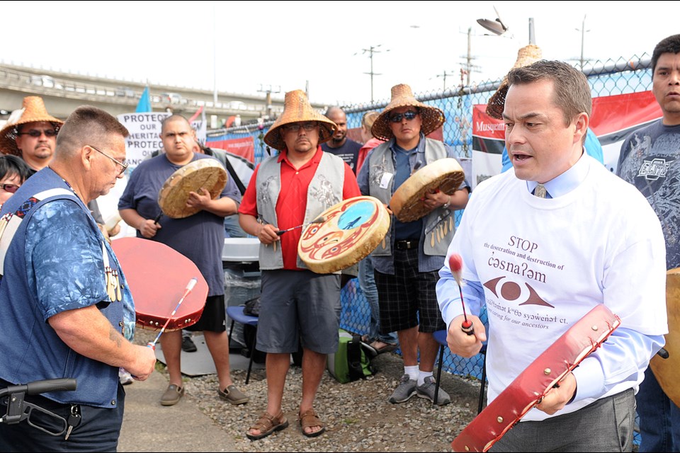 National Assembly of First Nations Chief Shawn Atleo (r) visited the Marpole Village burial site during the Musqueam protests there in May. file photo Dan Toulgoet