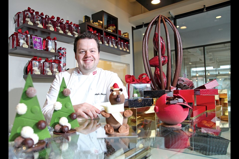 Chocolate Christmas: The display case at Chez Christophe Chocolaterie Patisserie in the Heights is all decked out with chocolate Santa bears, truffle-decorated trees and more made by chocolatier Christophe Bonzon.