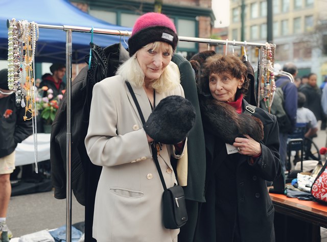 Dodo and Maggie, friends since they were in their 20s, showed up mid-afternoon with an assortment of clothing to sell. Photo by: Rebecca Blissett