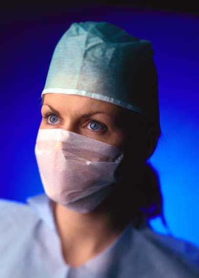 female_surgeon_with_surgical_mask.jpg