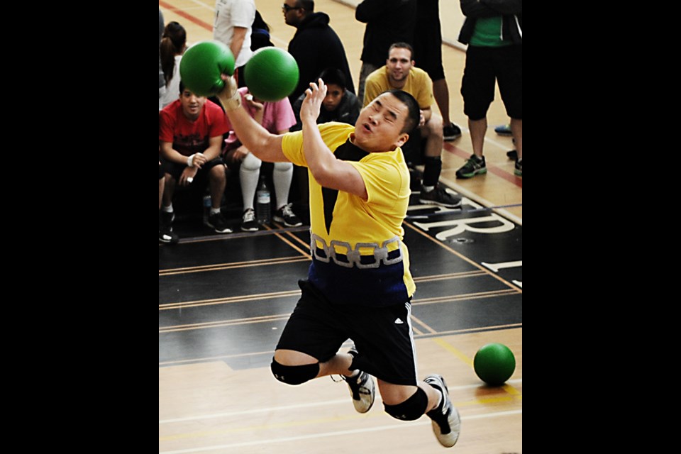 Shawn Chow gets nailed in the face in a game with his Avengers 2.0 team during the Vancouver Dodgeball League championships Dec. 7 at Van Tech secondary.