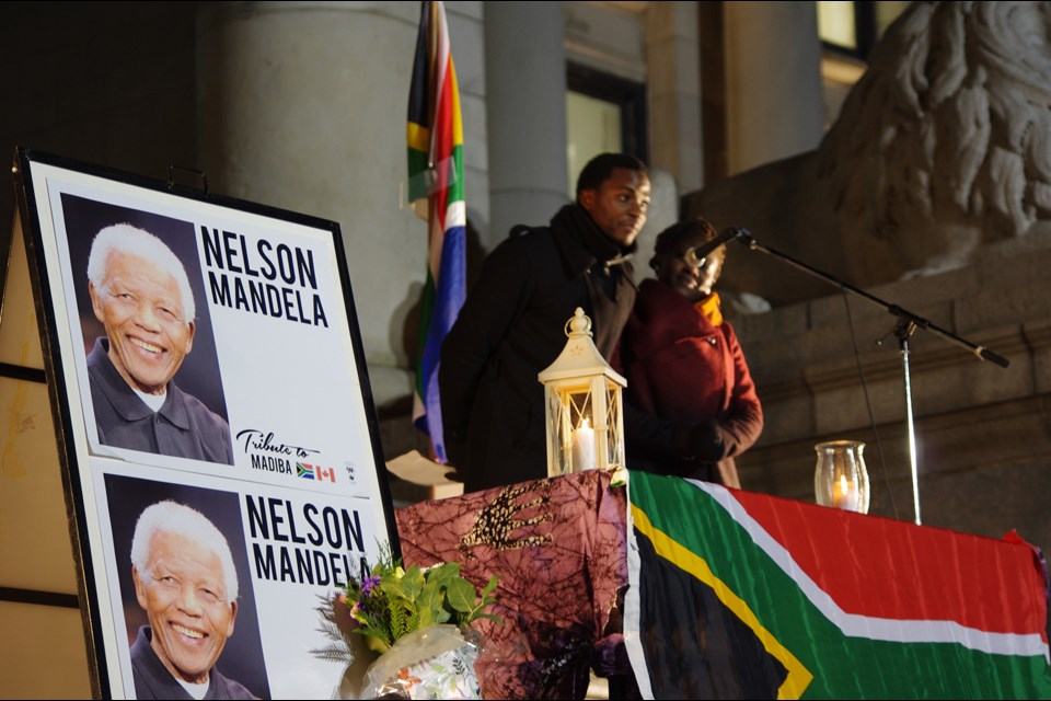 An estimated 300 people attended a vigil at the Vancouver Art Gallery last Friday to mark the passing of Nelson Mandela. The crowd heard speeches from members of various African-Canadian cultural groups. photo Gavin Fisher