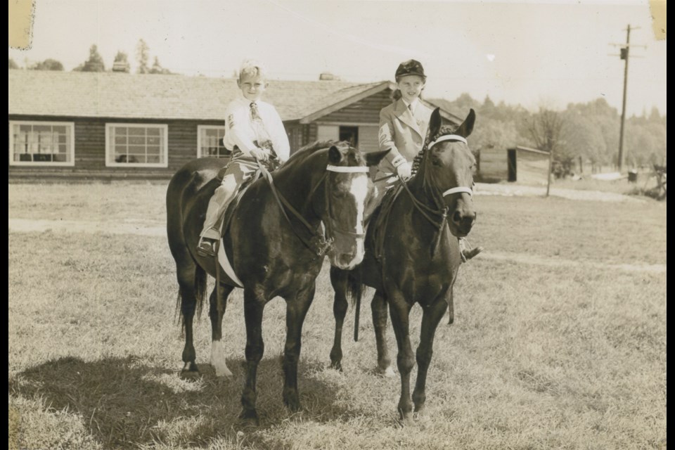 Rick Maynard and April Glaspie outside the Southlands Riding Club clubhouse in 1950.