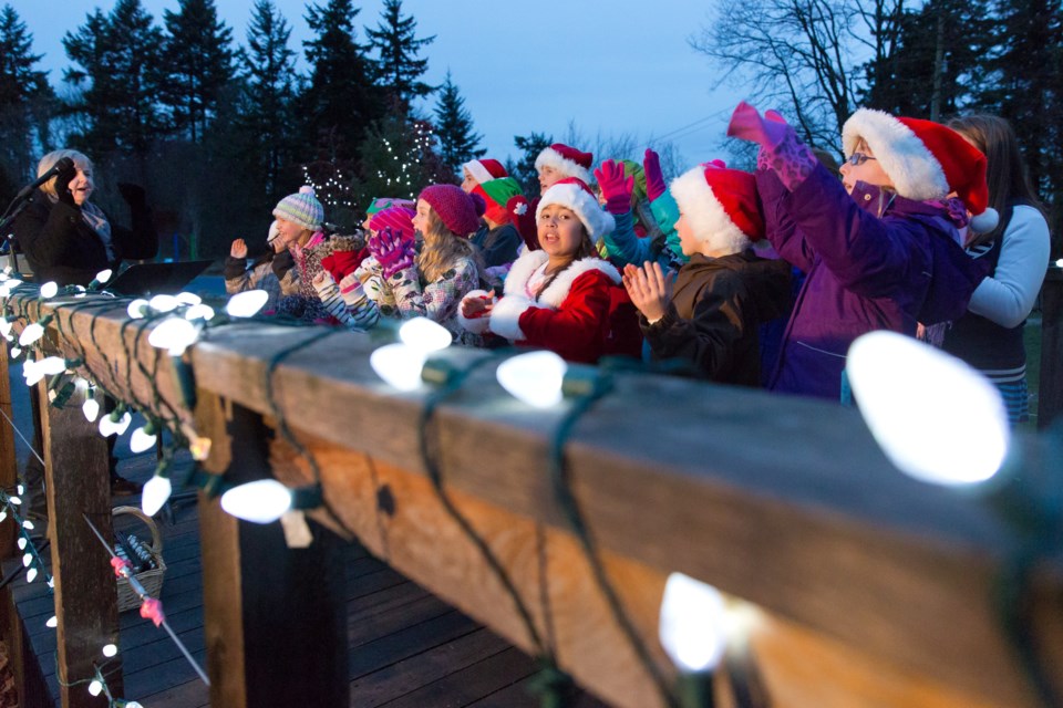 The Rotary Club of Tsawwassen got into the Christmas spirit over the weekend with its Light Up the Park event at Diefenbaker Park. For the past few weeks, Rotarians have braved the cold, wind and rain to put up more than 1,700 lights around the park, which were switched on at the event Saturday, Dec. 14. The event included hot chocolate courtesy of the South Delta Secondary Interact Club and caroling by Beach Grove Elementary students.