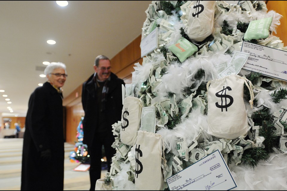 Winning trees at the annual Festival of Trees included Tracey Jackson’s “Alimony Tree." The trees are on display at the Four Seasons Hotel until Jan. 2. Photo Dan Toulgoet
