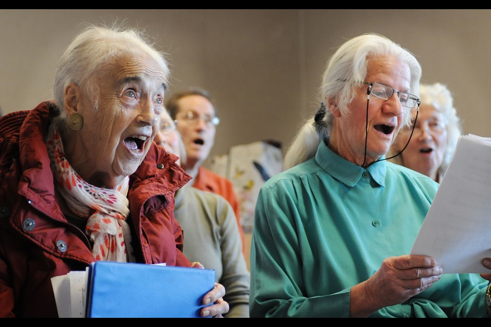 Pauline Wenn (l) and Gisela, who only goes by her first name, are two of the many regular members of the Highs and Lows, a choir that was founded in 1993 for people with or who’ve experienced mental illness and their families and supporters. photo Dan Toulgoet