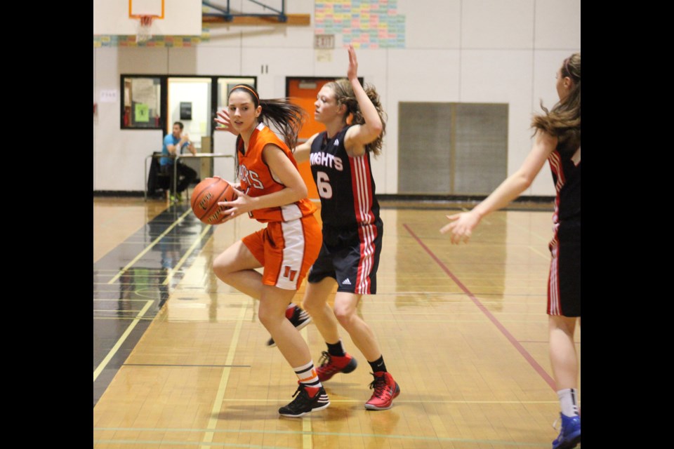 12-19-2013 NWSS (orange) vs STM at the Bob Gair Classic at NWSS. Photo: Jason Lang