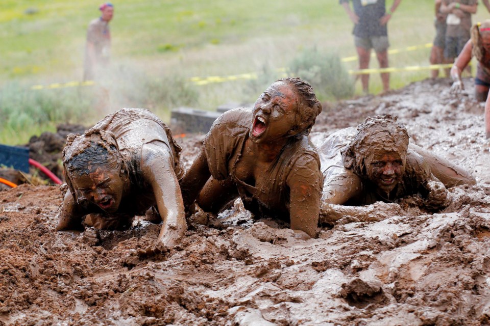 Three women get down and filthy in the Dirty Dash, coming to Vancouver next July.