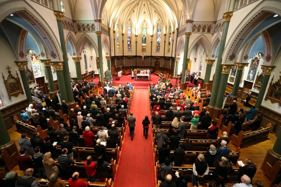 Dozens of people attended mass Christmas morning at St. Andrew's Cathedral on Blanshard Street.