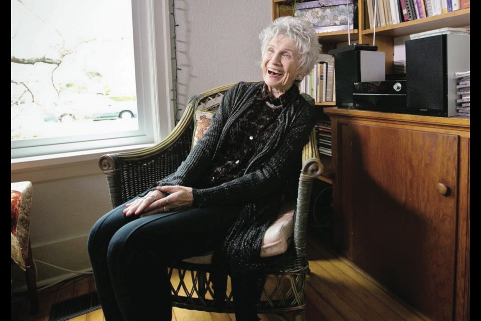 Author Alice Munro laughs during an interview about her Nobel Prize win this year.