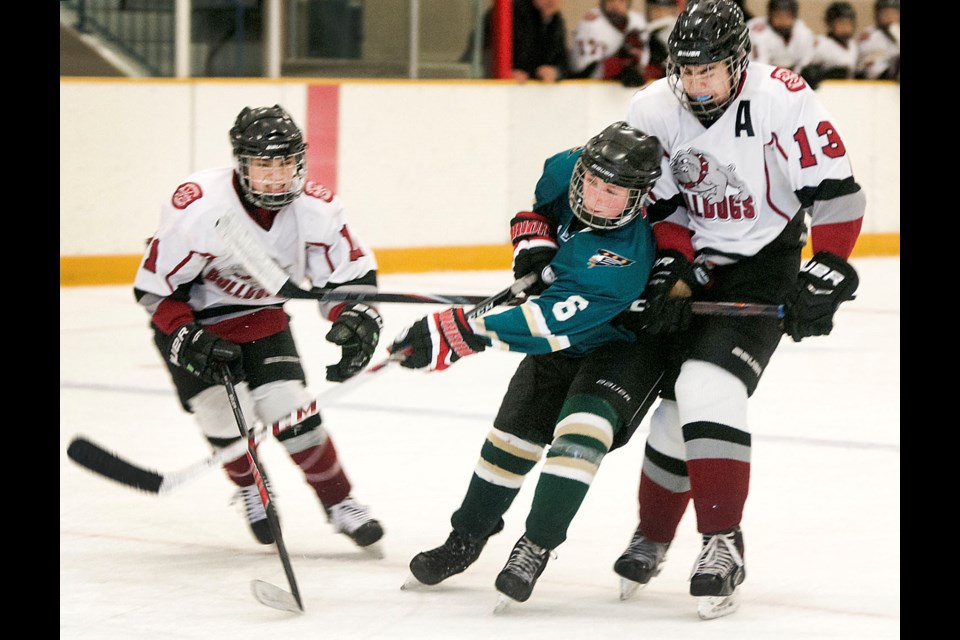 12-28-2013 Bantam AAA International Tournament at Burnaby Lake Arena
Burnaby Bulldogs (white) vs Squamish Eagles. Chung Chow photo