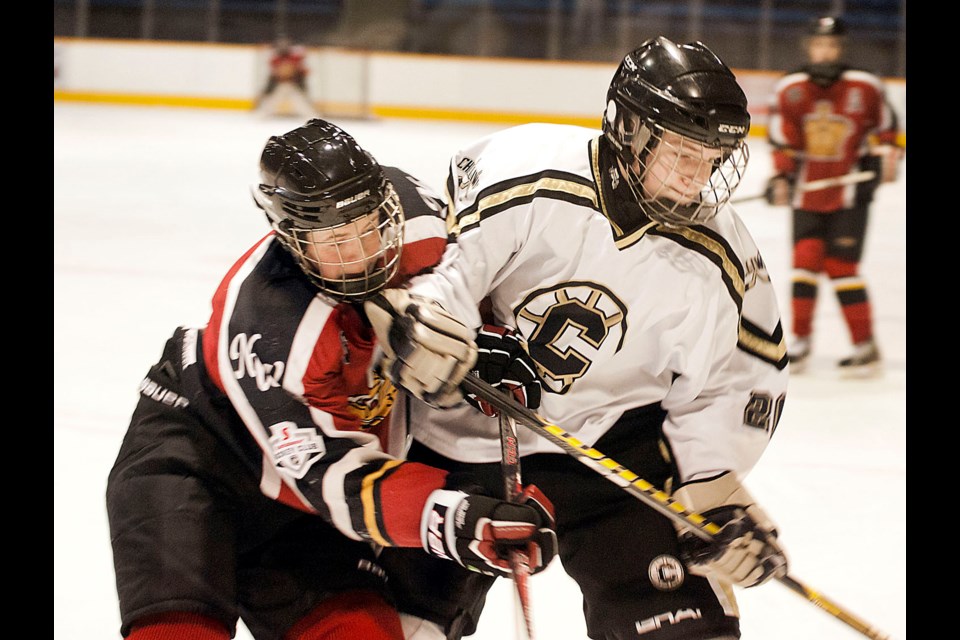 12-28-2013 Herb House Hockey Tournament at Queen's Park Arena
New Westminster A1 Midgets (red) vs Chilliwack A2. Chung Chow photo