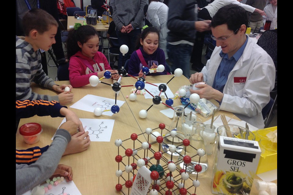 John Canal, a senior SFU chemistry lecturer, shows University Highland Elementary students how to make molecules with marshmallows in the new outreach centre at SFU. On Thursday, the university officially opened the centre and announced a new $4.4 million astronomical observatory will open on campus in August.