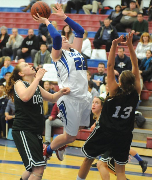Capilano University's Elise Horton flies to the hoop during a PacWest league game against Quest earlier this season. Horton is one of the few veteran players on a Blues team that is rebuilding with rookies.