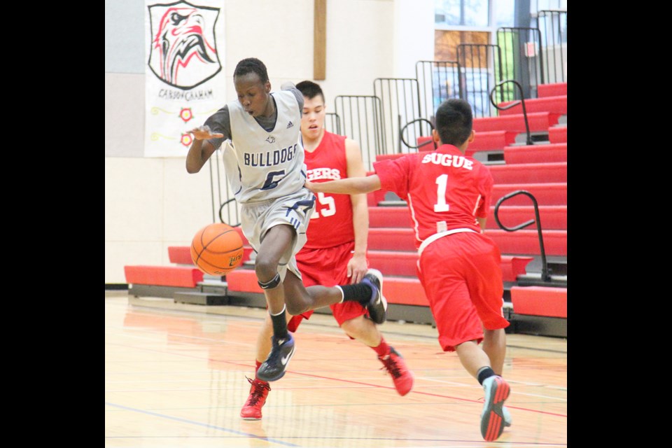 01-09-2014 Byrne Creek (grey) vs Tupper in second day of Chancellor high school boys basketball tournament at STM. photo Jason Lang
