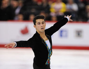 North Vancouver's Liam Firus flies up the ice during the Canadian figure skating championships held Saturday in Ottawa. The 21-year-old finished third, earning a berth in the 2014 Olympic Winter Games in Sochi, Russia.